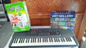 lot 713 image: Casio Keyboard And More.