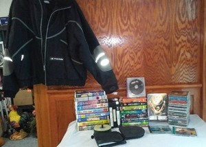 lot 749 image: Lot of VHS Tapes, DVDs, CDs, Mixed Media Collection and More.