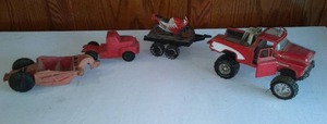 lot 803 image: Vintage Auburn and Tootsie Toys