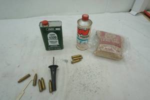 lot 137 image: smokeless powder, lead shot, and bullet cases