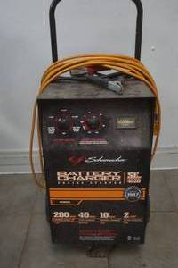 lot 244 image: battery charger and extension cord 2-200 AMP