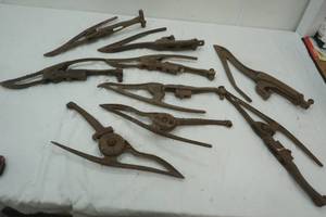 lot 242 image: Vintage Noll Bros sickle mower crop lifter- cast iron