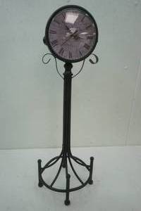 lot 252 image: double sided standing clock 27 tall
