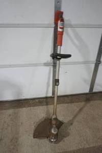 lot 369 image: Black and Decker weed whip Lithium 40V and charging block