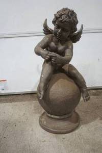 lot 385 image: Angel cherub on ball statue