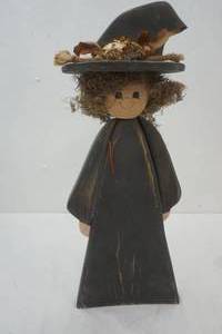 lot 557 image: wooden witch decoration 22 tall