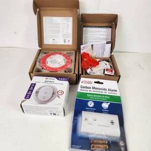 lot 23 image: Lot Of Four Smoke Detectors 1 Smoke Alarm 1 Carbon Monoxide Detector 2 Smoke Carbon Monoxide