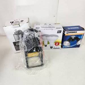 lot 25 image: Two New 65w Flood Lights Two Designer Fountain 1161-BK Outdoor Lights And Brinks Flood Security Light Open Box Damaged Box