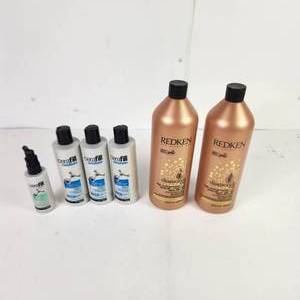 lot 48 image: Two Large Bottles Of Redken Diamond Oil Gel Conditioner Three Cerafill Retaliate And Defy