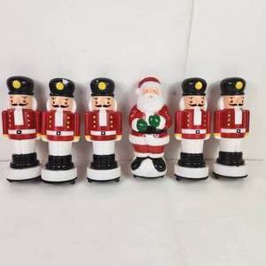 lot 90 image: Mini Blow Molds 5 Nutcrackers and a Santa