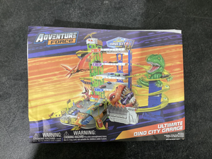 lot 612 image: Adventure Force Ultimate Dino City Garage, Die-Cast Vehicle Playset, Multi-Color, Age 3