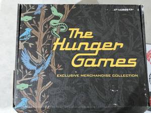 lot 402 image: LOT OF 2 The Hunger Games Exclusive Merchandise Box Collection