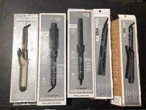 lot 560 image: LOT OF 5 Womens Hair Styling Products