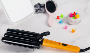 lot 568 image: LOT OF 2 Danielle Creations Triple Barrel Hair Waver