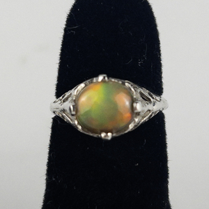 lot 30 image: Opal Solitaire Sterling Silver Ring. Size 4.75 - 5.