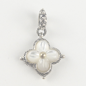 lot 49 image: Barbara Bixby Mother of pearl inlay sterling and 18K yellow gold charm . Estimated Replacement value $175