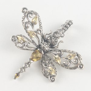 lot 56 image: Barbara Bixby Multi-gemstone dragonfly sterling and 18K yellow gold enhancer (no chain). Estimated Replacement value $350