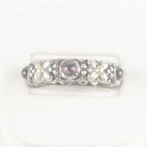 lot 60 image: Barbara Bixby Garnet Stack Sterling And 18K Yellow Gold Ring Estimated Replacement Value $175. Size 9 - 9.25.