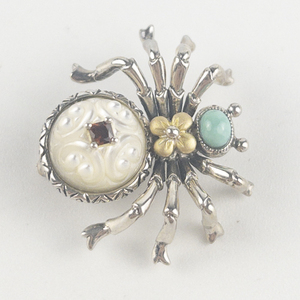 lot 62 image: Barbara Bixby Multi-Gemstone Sterling And 18K Yellow Gold Brooch Estimated Replacement Value $200.
