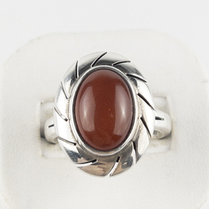 lot 72 image: QVC Design (Mexico)  Oval Cabochon Carnelian Etched Boarder Sterling Silver Statement Ring . Size 9.75 - 10.