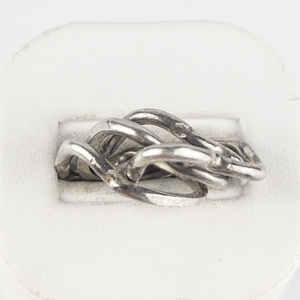 lot 98 image: Puzzle Silver Tone Base Metal Ring. Size 4.25 - 4.5.