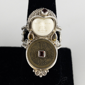 lot 107 image: Sajen Tibetan Coin GodessSterling Silver Statement Ring . Size 11.5 - 11.75.