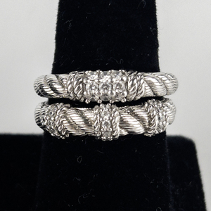 lot 115 image: Judith Ripka Set Of Two Bead-Set Diamonique Rope-Design Boarder sterling Silver Stack Rings. Size 11 - 11.25.