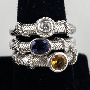 lot 117 image: Judith Ripka Set Of Three Oval Iolite, Round Citrine, & Diamonique Sterling Silver Stacking Ring Estimated Replacement Value $165. Size 11 - 11.25.