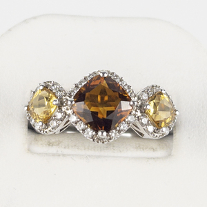 lot 118 image: Heritage Gems  Madiera Citrine Three Stone Sterling Silver Statement Ring Estimated Replacement Value $150. Size 10 - 10.25.