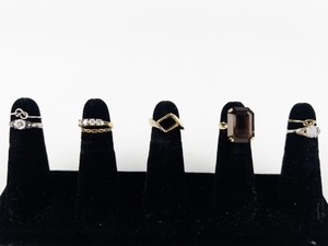 lot 125 image: Group of 8 Base Metal Rings. Size 3.5-5.