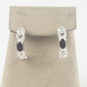 lot 165 image: Oval Cut Garnet Silver Tone Base Metal Half-Hoop Pierced Earrings.