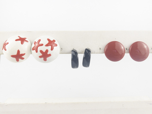 lot 175 image: Group of 3  Red, White & Black Base Metal Pierced Earrings .
