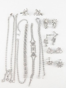 lot 178 image: Group of 10 White Rhinestone Silver Tone Base Metal Non-Pierced Earrings, Bracelets, & Necklaces.