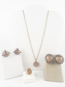 lot 179 image: Set of four  Sparkling Rose Gold Tone Base Metal Non-Pierced Earrings, Necklace, & Ring, Size 5.5.