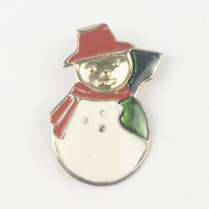 lot 185 image: Enamel Inlay Snowman Gold Tone Base Metal Brooch .