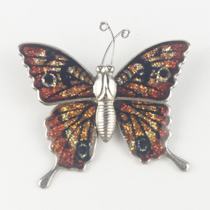 lot 199 image: Red Orange Enamel Butterfly Gold Tone Base Metal Brooch .