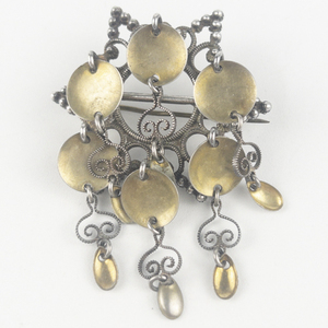 lot 203 image: Nils Erik Elvik (Norway) Traditional Handmade Norwegian Golden Spoon Star 830 Silver Solje Brooch. Gilt Dangling Disks.