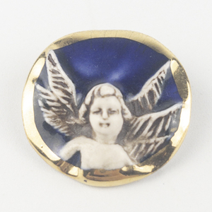 lot 209 image: Angelic Midnight Angel Cupid Cherub Yellow Base Metal Brooch .