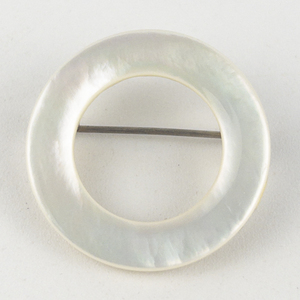 lot 214 image: Mother Of Pearl Circle Gold Tone Base Metal Brooch .