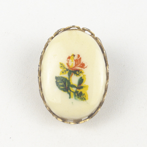 lot 215 image: Floral Rose Cameo Gold Tone Base Metal Brooch .