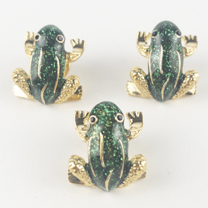 lot 216 image: Group of 3  Green Sparkling Enamel Inlay Froggold Tone Base Metal Pins.