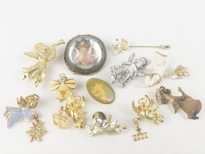 lot 227 image: Group of 12 Angel Gold Tone Base Metal Lapel Pins, Brooches, & Stick Pins.