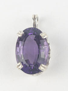 lot 232 image: Oval Brilliant Cut Amethyst sterling silver pendant (no chain). Replacement value $125