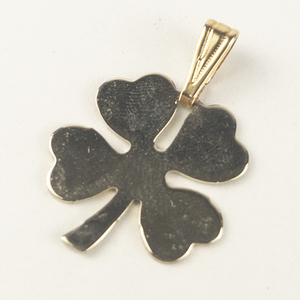 lot 249 image: Four leaf clover gold tone base metal pendant (no chain).