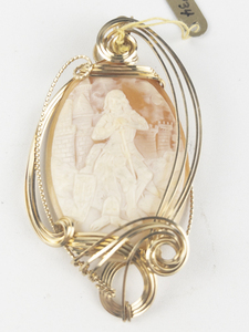 lot 261 image: New Old Stock Handcrafted large wrapped conqueror carved cameo gold filled wire pendant (no chain). Replacement value $185