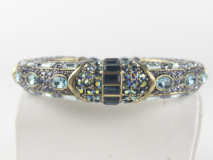 lot 264 image: Heidi Daus Purple & Blue Crystal Gold Tone Base Metal Hinged Cuff Bracelet.