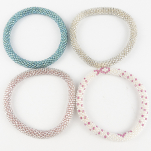 lot 266 image: Group of 4  Crochet Seed Bead Bracelets .