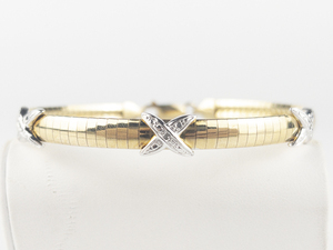 lot 273 image: Ken Craft  Diamond Accented X  Two Tone Sterling Silver Omega Bracelet.