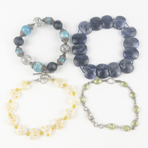 lot 294 image: Group of 4  Yellow Murano, Crackled Glass, Blue Sodalite, & Green Stone Base Metal Bracelets.