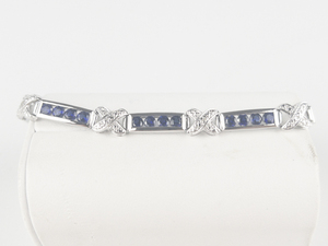 lot 303 image: Ross Simons  Lab Grown Sapphire Platinum Plated Sterling Silver Tennis Bracelet.